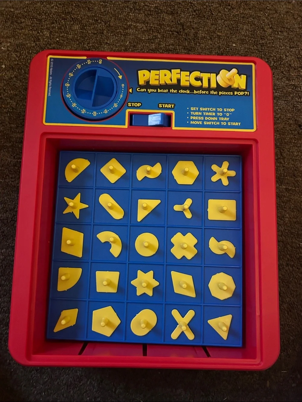 Hasbro Perfection Board Game - Blue & Yellow Box Art 5+ Can you Beat the Clock?